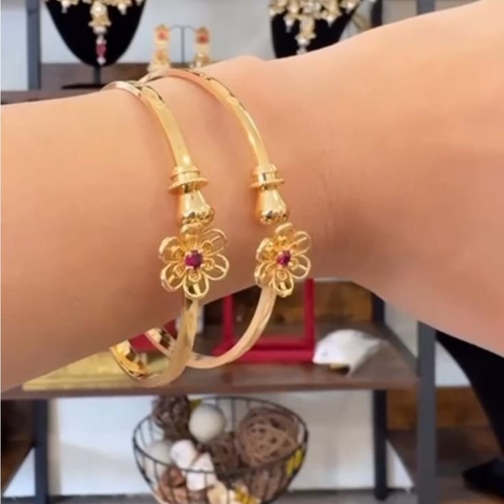 Elegant Gold Floral Bangles with Red Stone Center