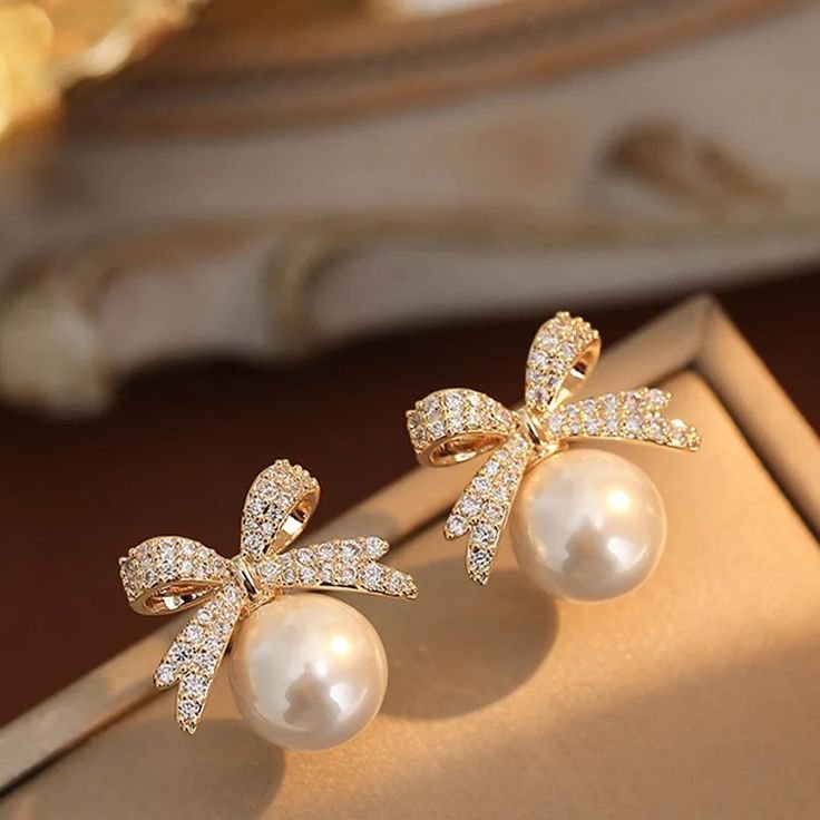 Luxurious Gold Bow and Pearl Stud Earrings