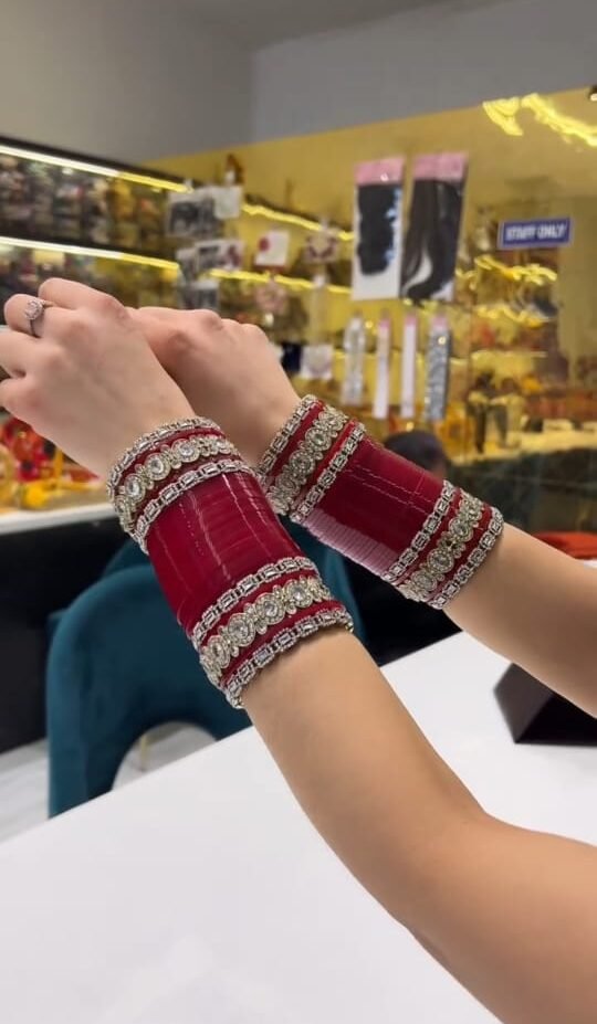 Elegant Red Chura with Embellishments