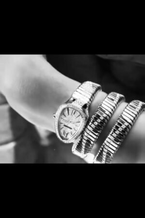 Elegant Black and White Watch with Bracelets