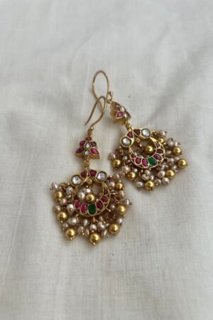 Traditional Gold Jhumka Earrings with Gemstones and Pearls