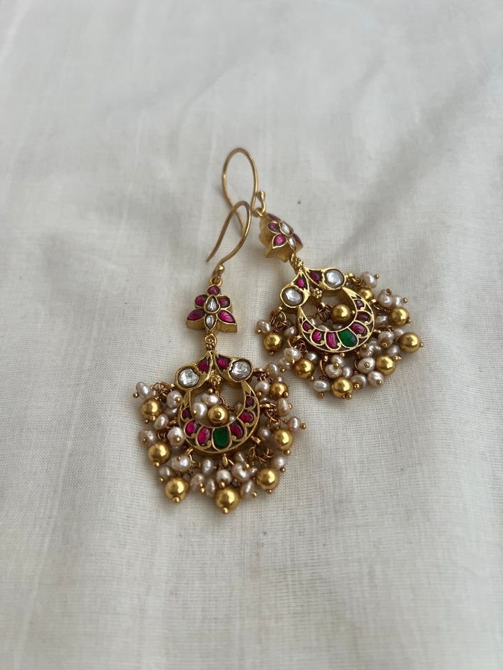 Traditional Gold Jhumka Earrings with Gemstones and Pearls